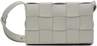 Серая маленькая сумка-кассета Bottega Veneta 4086322